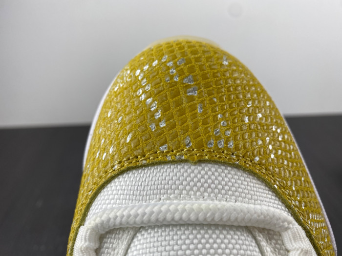 air jordan 11 low wmns “yellow snakeskin” ah7860-107.
