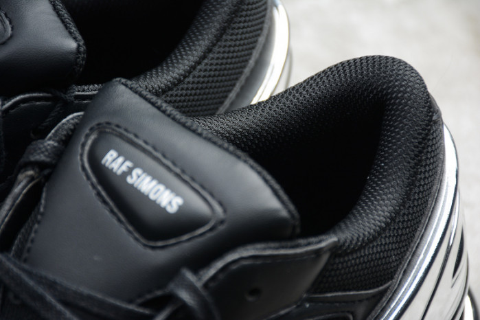 a*d*das ozweego raf simons core black silver metallic ee7944