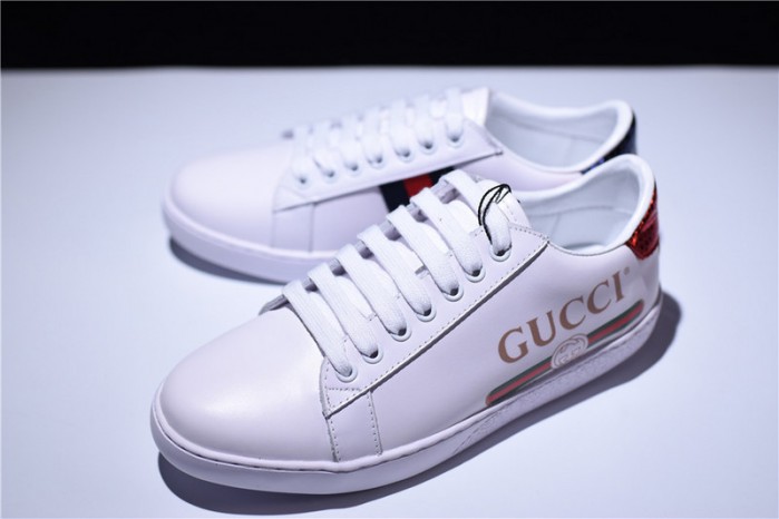 gu ace embroidered low-top sneaker with logo